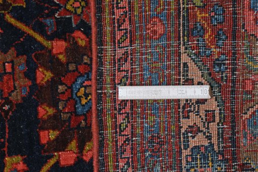 Corner detail of 1930s Bijar rug showing border pattern and Wool pile