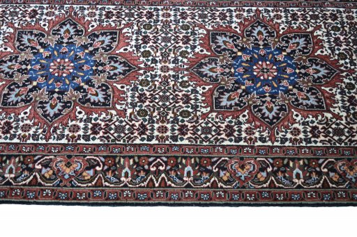 Full view of New Bijar rug from Iran / Persia, 337 × 68 cm in Beige tones
