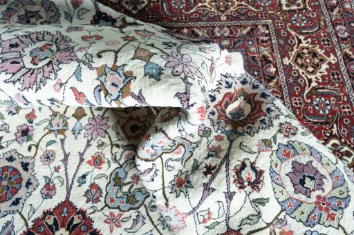 Corner detail of New Bijar rug showing border pattern and Cork pile