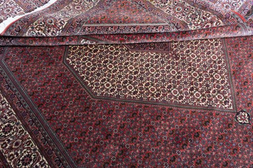 Corner detail of New Bijar rug showing border pattern and Cork pile