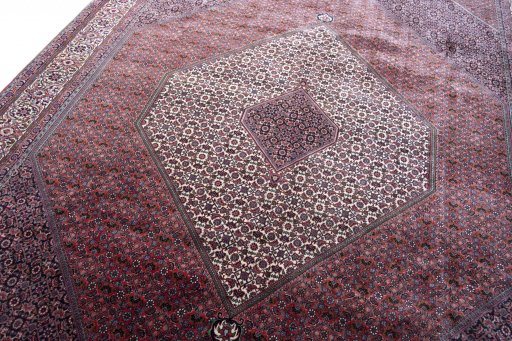 Backside of handmade New Bijar rug showing knot structure and weave density