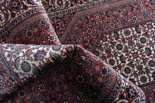 Corner detail of New Bijar rug showing border pattern and Cork pile