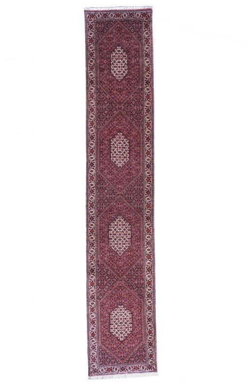 Full view of New Bijar rug from Iran / Persia, 405 × 76 cm in Red tones