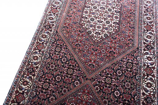 Backside of handmade New Bijar rug showing knot structure and weave density