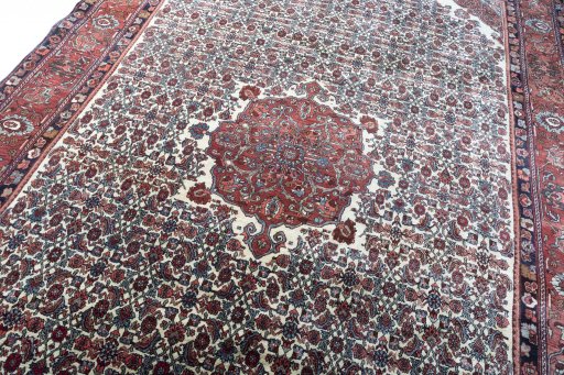 Backside of handmade 1970s Bijar rug showing knot structure and weave density
