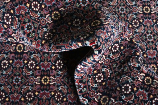 Corner detail of New Bijar rug showing border pattern and Cork pile