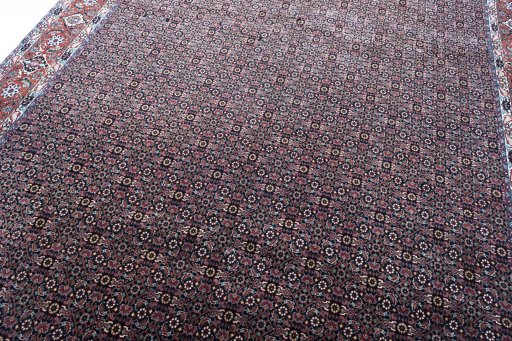 Backside of handmade New Bijar rug showing knot structure and weave density