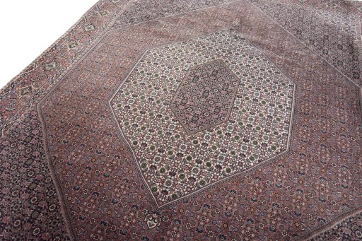 Backside of handmade New Bijar rug showing knot structure and weave density