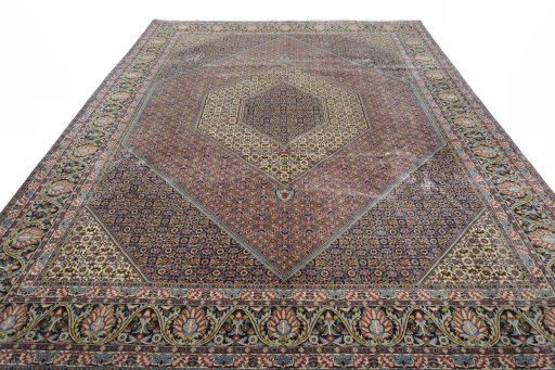 Surface texture of 2000s Bijar rug with natural Cork and intricate pattern