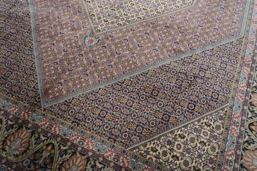 Close-up detail of 2000s Bijar rug from Iran / Persia showing Cork weave
