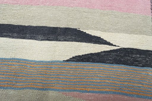 Backside of handmade New Bijar rug showing knot structure and weave density