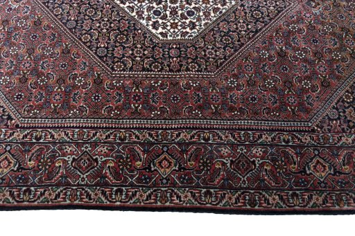 Corner detail of New Bijar rug showing border pattern and Cork pile