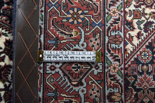 Backside of handmade New Bijar rug showing knot structure and weave density