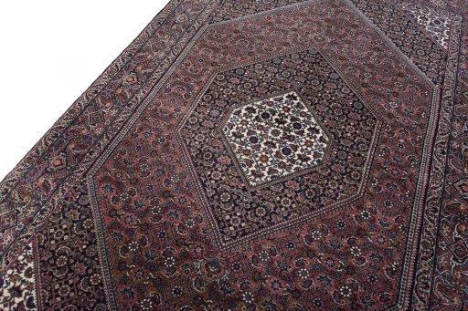 Backside of handmade New Bijar rug showing knot structure and weave density
