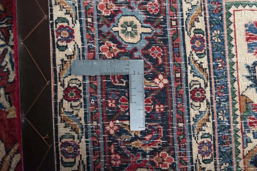 Backside of handmade 1970s Bijar rug showing knot structure and weave density