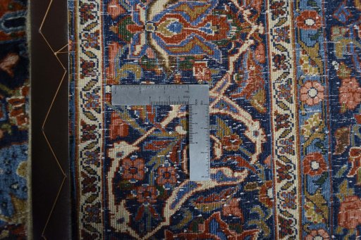 Backside of handmade 1970s Bijar rug showing knot structure and weave density