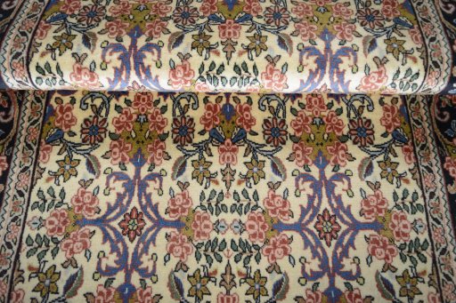 Close-up detail of 2000s Bijar rug from Iran / Persia showing Wool weave