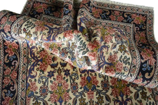 Surface texture of 2000s Bijar rug with natural Wool and intricate pattern