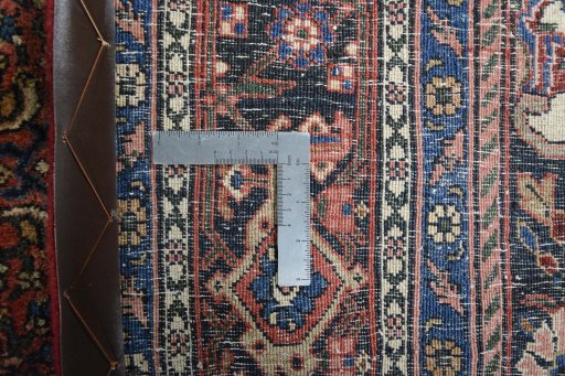 Backside of handmade 1970s Bijar rug showing knot structure and weave density
