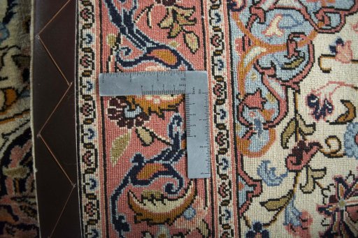 Backside of handmade New Bijar rug showing knot structure and weave density