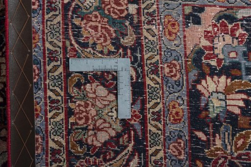 Backside of handmade 1970s Bijar rug showing knot structure and weave density