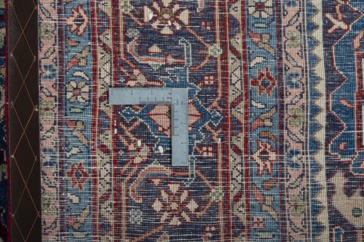 Backside of handmade 1970s Bijar rug showing knot structure and weave density