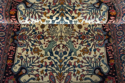 Corner detail of 2000s Bijar rug showing border pattern and Wool pile