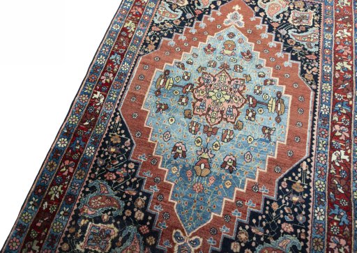 Backside of handmade 1930s Bijar rug showing knot structure and weave density