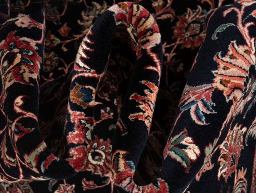 Backside of handmade New Bijar rug showing knot structure and weave density