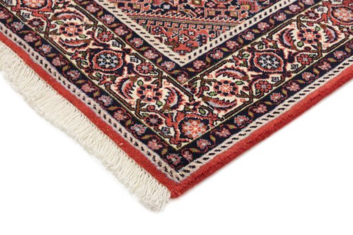 Backside of handmade New Bijar rug showing knot structure and weave density