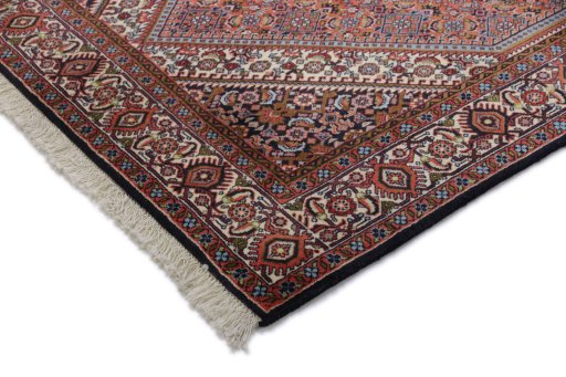 Backside of handmade New Bijar rug showing knot structure and weave density