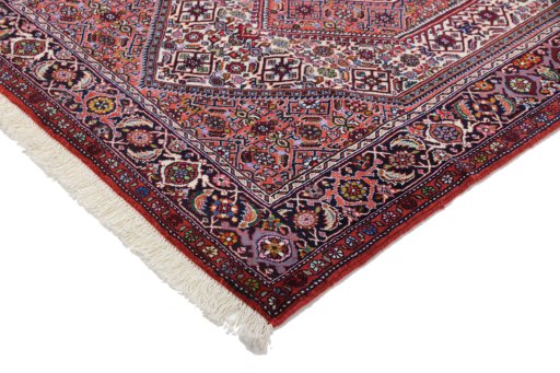 Backside of handmade New Bijar rug showing knot structure and weave density