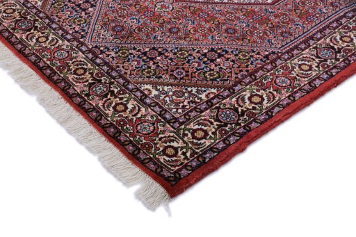 Backside of handmade New Bijar rug showing knot structure and weave density