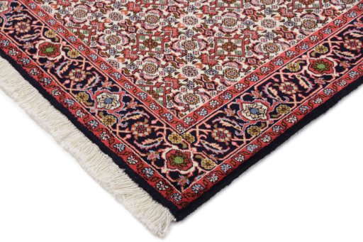 Backside of handmade New Bijar rug showing knot structure and weave density