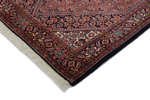 Backside of handmade New Bijar rug showing knot structure and weave density