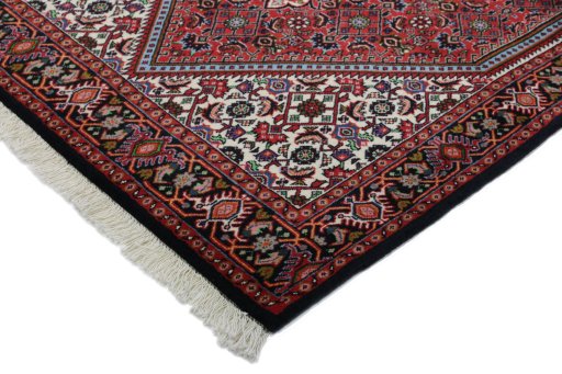 Backside of handmade New Bijar rug showing knot structure and weave density