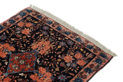 Surface texture of 1920s Bijar rug with natural Wool and intricate pattern