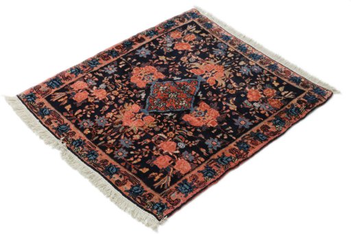 Close-up detail of 1920s Bijar rug from Iran / Persia showing Wool weave