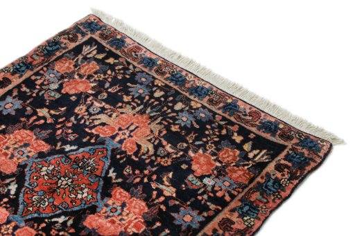 Surface texture of 1920s Bijar rug with natural Wool and intricate pattern