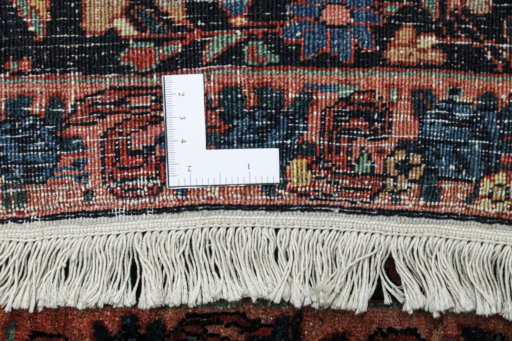 Close-up detail of 1920s Bijar rug from Iran / Persia showing Wool weave