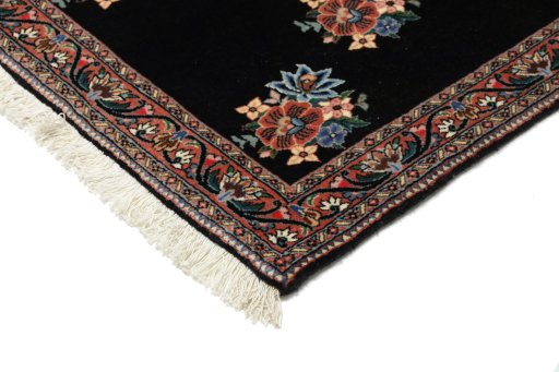Backside of handmade New Bijar rug showing knot structure and weave density