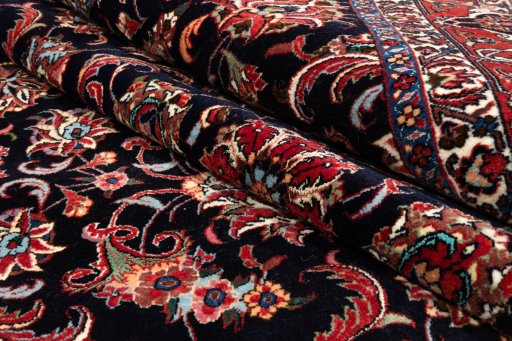 Surface texture of 2020s Bijar rug with natural Wool and intricate pattern