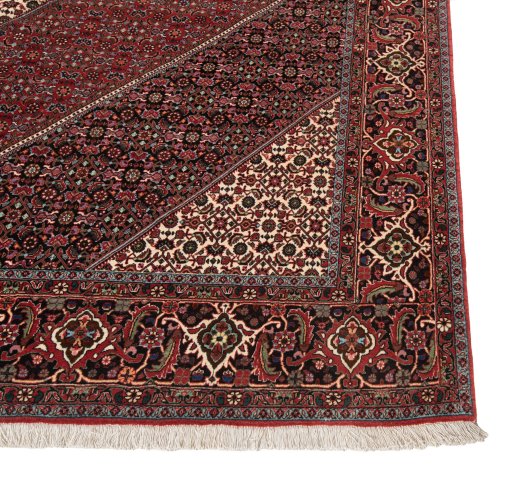 Backside of handmade New Bijar rug showing knot structure and weave density