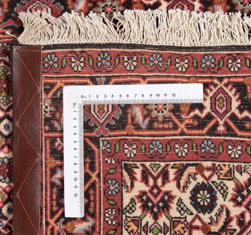Backside of handmade New Bijar rug showing knot structure and weave density