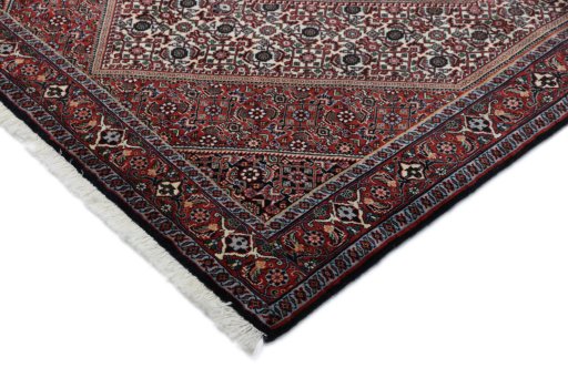 Backside of handmade New Bijar rug showing knot structure and weave density