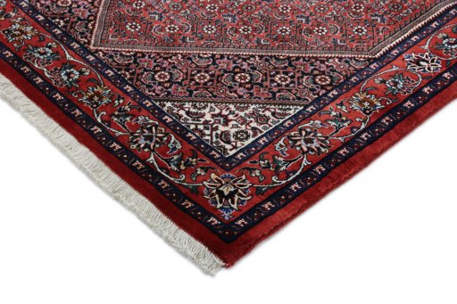 Backside of handmade New Bijar rug showing knot structure and weave density
