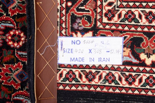 Backside of handmade New Bijar rug showing knot structure and weave density