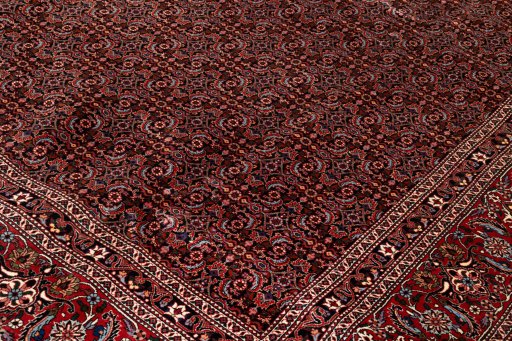 Backside of handmade New Bijar rug showing knot structure and weave density