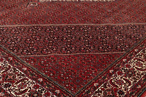 Backside of handmade New Bijar rug showing knot structure and weave density