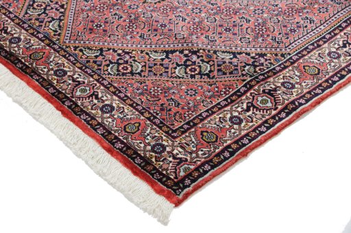 Backside of handmade New Bijar rug showing knot structure and weave density